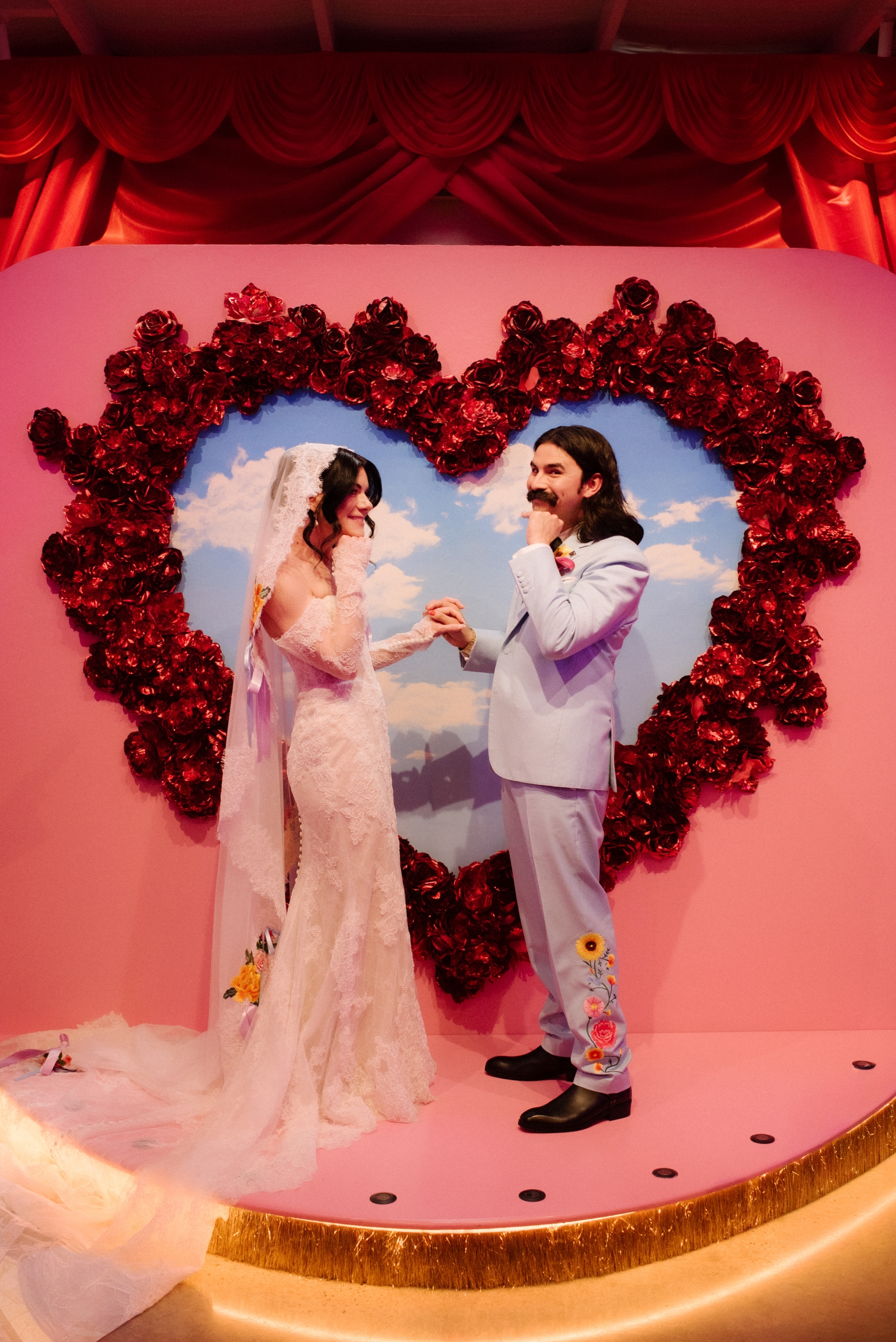 the bride and groom take a moment during their wedding ceremony