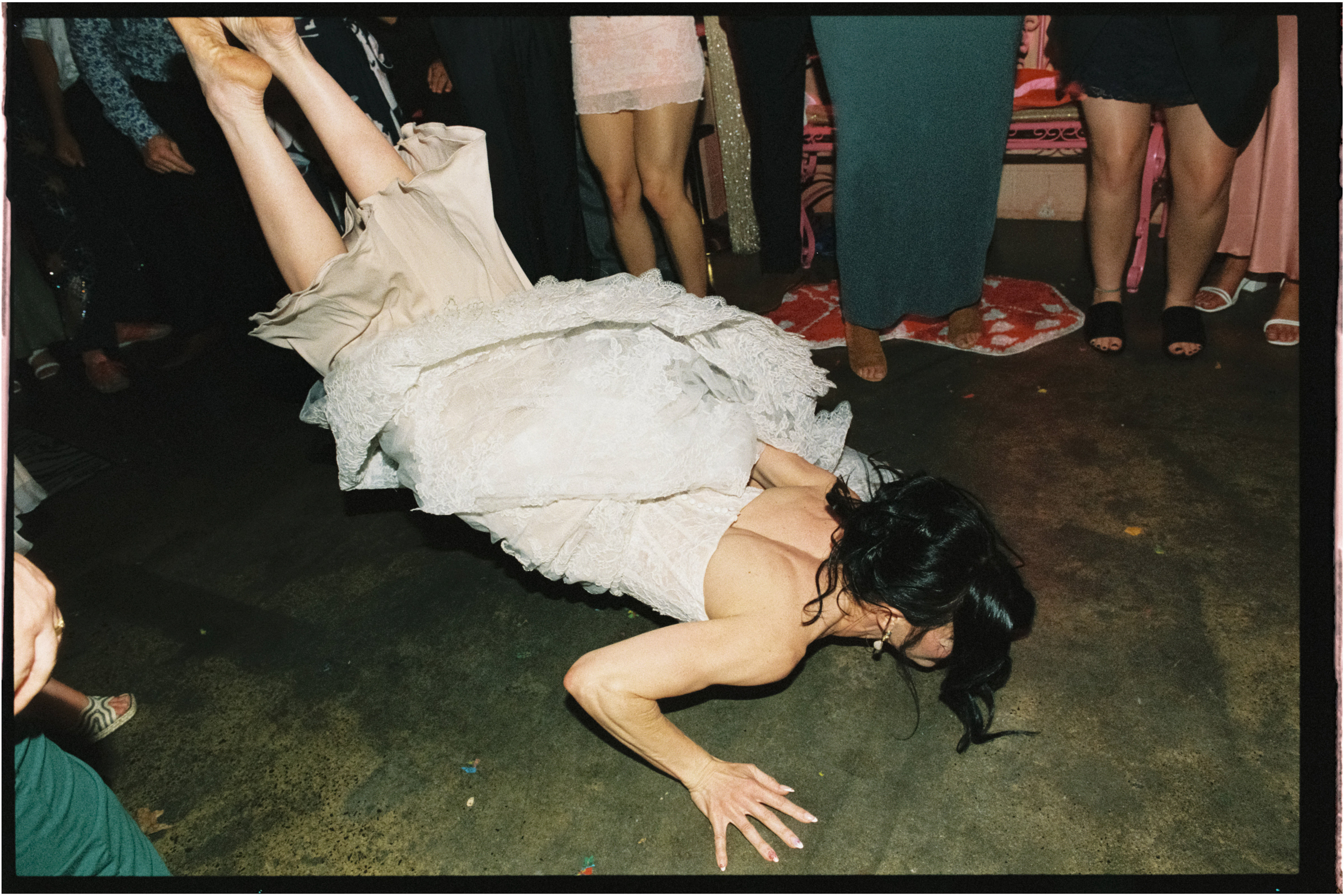 the bride performs the worm dance move at their wedding reception
